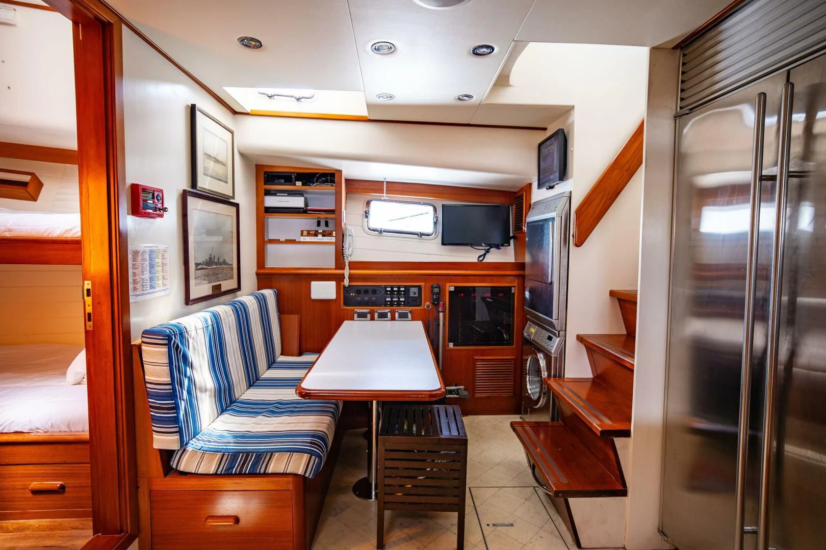 a room with a table and chairs aboard SEA BOLD Yacht for Sale