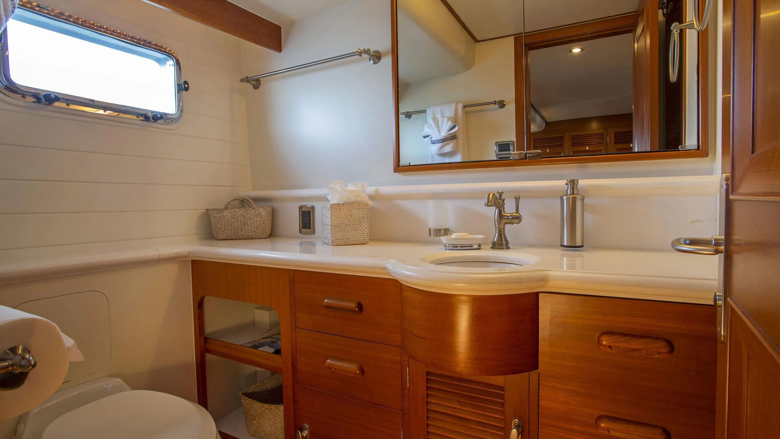 a bathroom with a large mirror aboard SEA BOLD Yacht for Sale