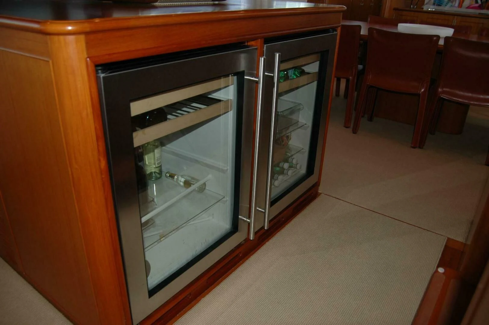 a cabinet with a glass door aboard SEA BOLD Yacht for Sale