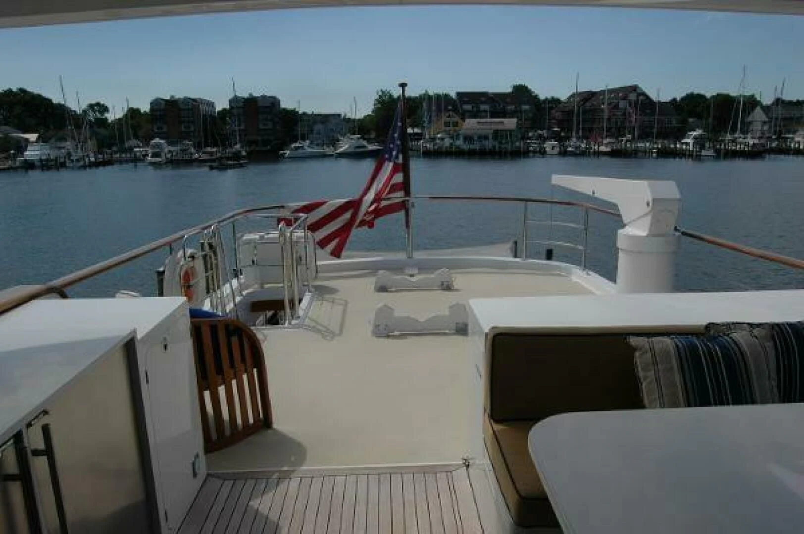 a boat with a flag on the front aboard SEA BOLD Yacht for Sale