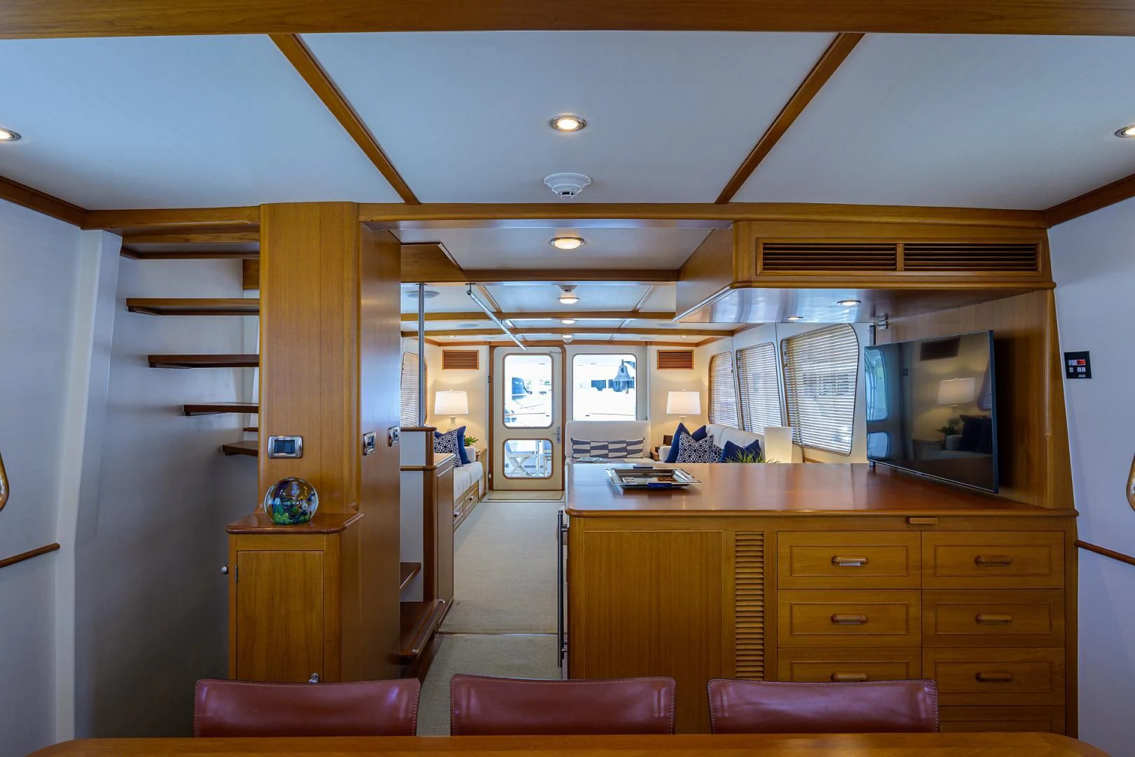 a kitchen with wooden cabinets aboard SEA BOLD Yacht for Sale
