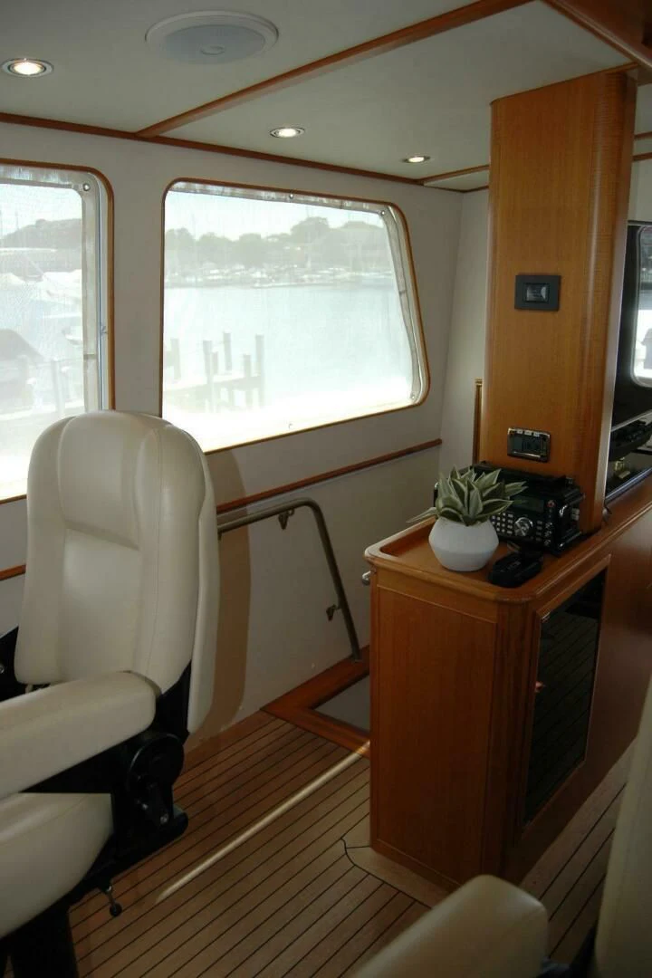 a room with a desk and a chair and a window aboard SEA BOLD Yacht for Sale