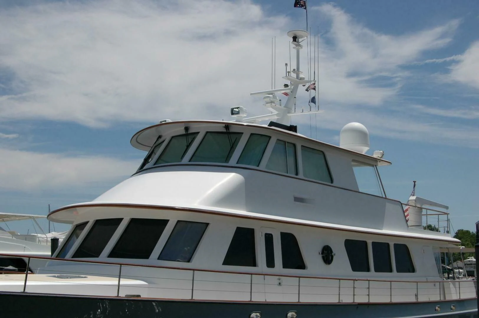 a white yacht with black trim aboard SEA BOLD Yacht for Sale