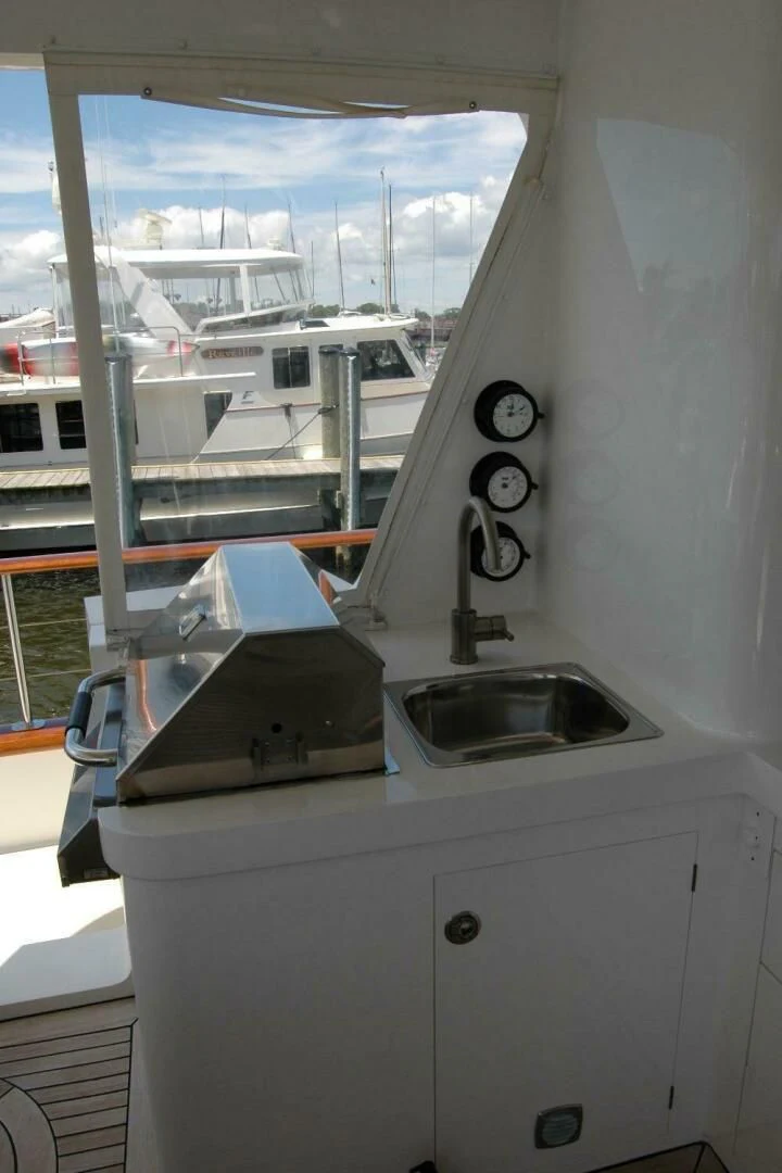 a sink and a laptop on a boat aboard SEA BOLD Yacht for Sale