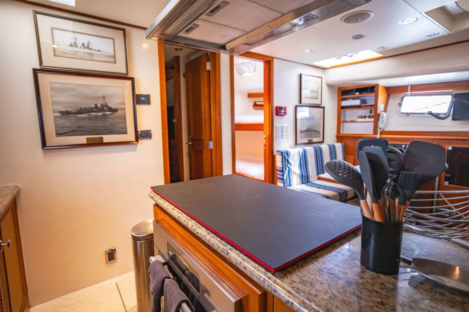 a room with a table and chairs aboard SEA BOLD Yacht for Sale