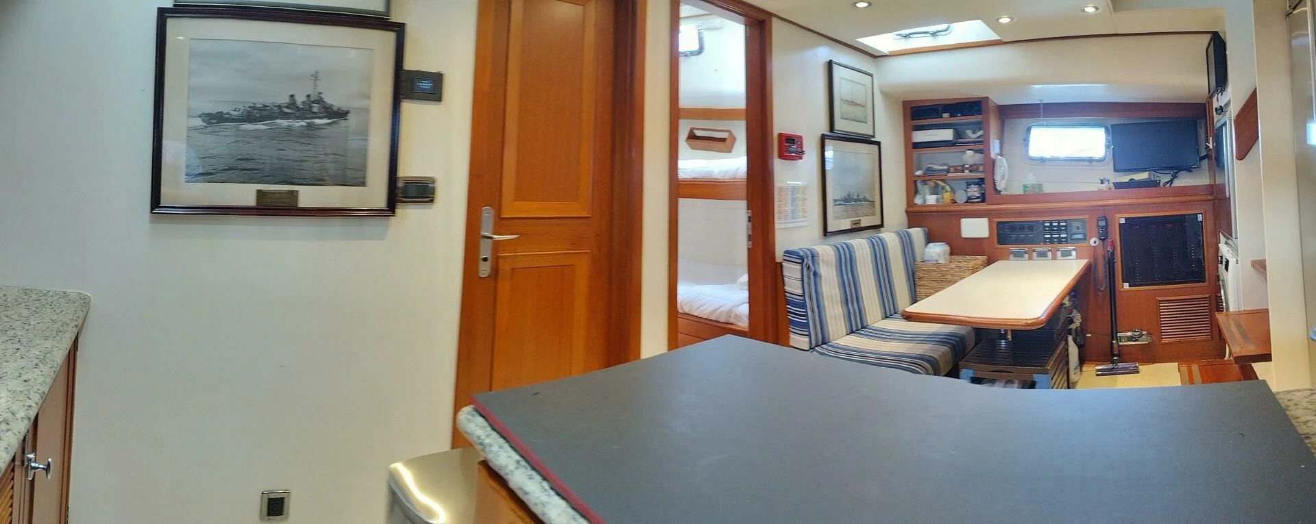 a room with a table and chairs aboard SEA BOLD Yacht for Sale
