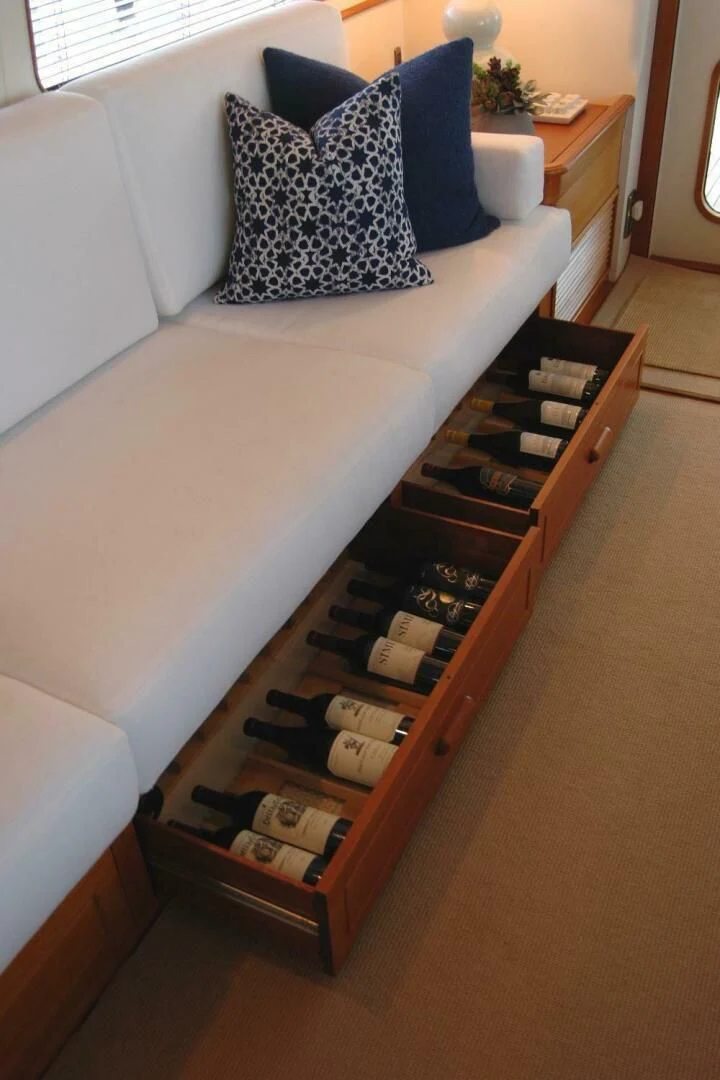 a couch with a coffee table aboard SEA BOLD Yacht for Sale