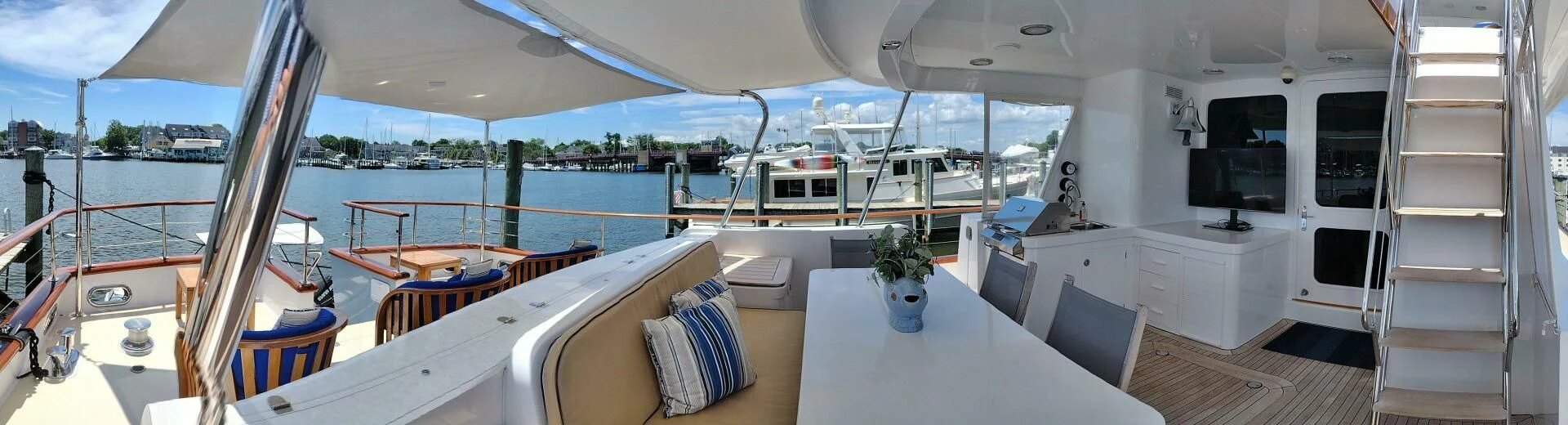 a boat with a deck and a balcony aboard SEA BOLD Yacht for Sale