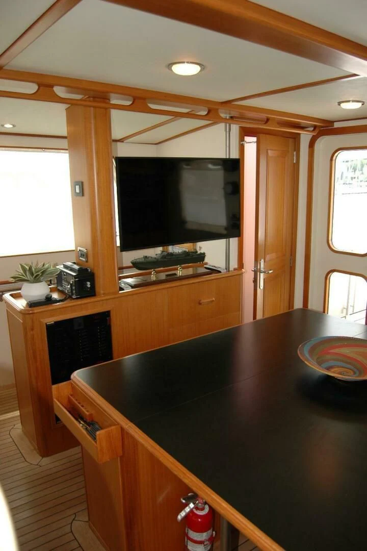 a kitchen with a black counter aboard SEA BOLD Yacht for Sale