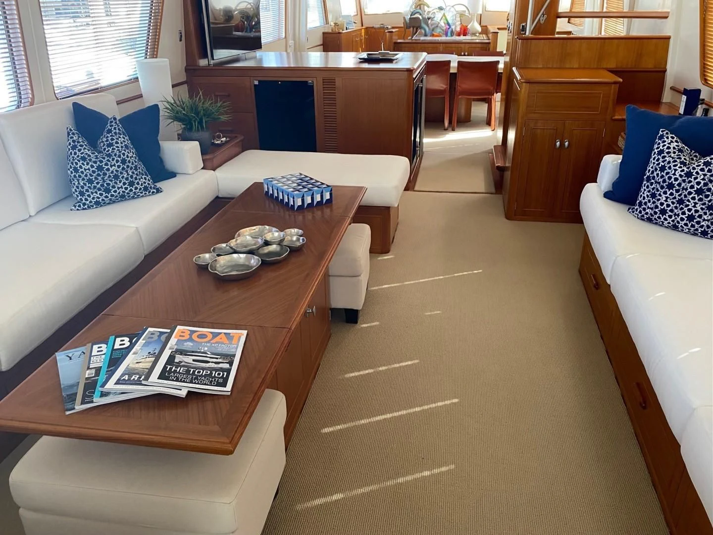a living room with a coffee table aboard SEA BOLD Yacht for Sale