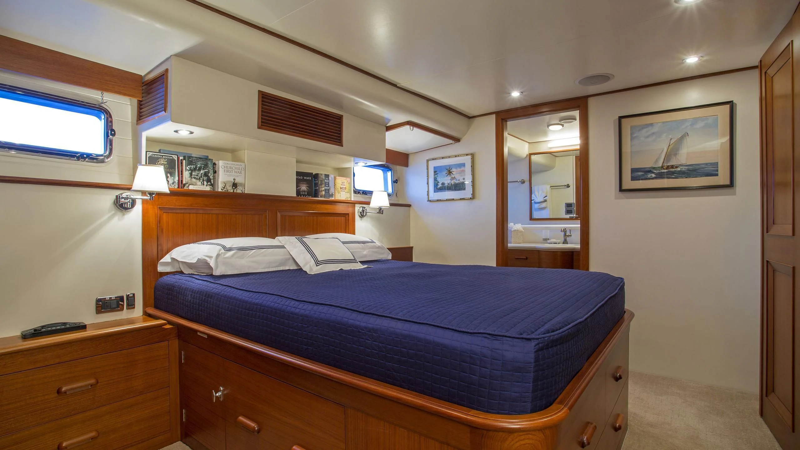a bedroom with a bed and a desk aboard SEA BOLD Yacht for Sale