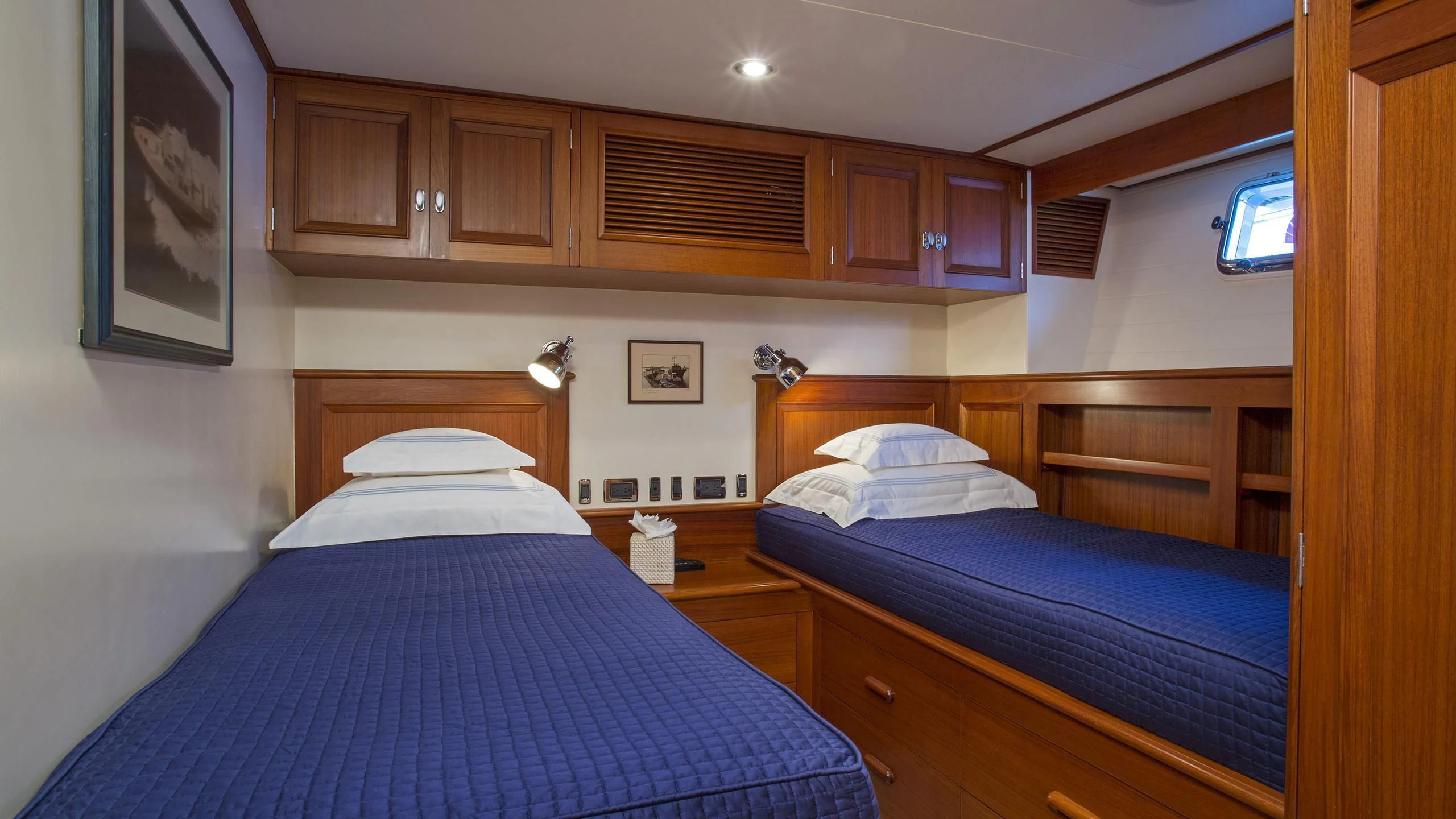 a couple of beds in a room aboard SEA BOLD Yacht for Sale
