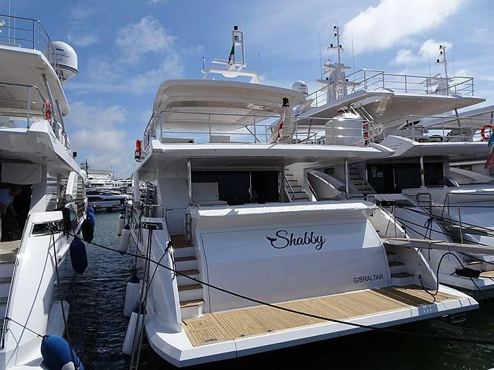a boat docked at a pier aboard KALA Yacht for Sale