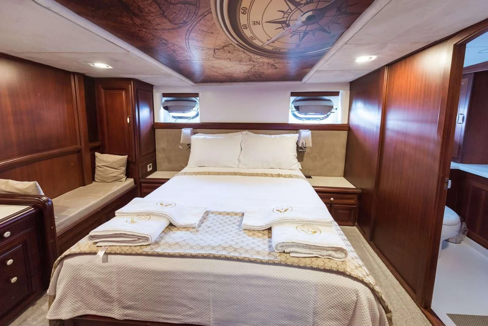 a room with two beds aboard VIRTUOSO Yacht for Sale