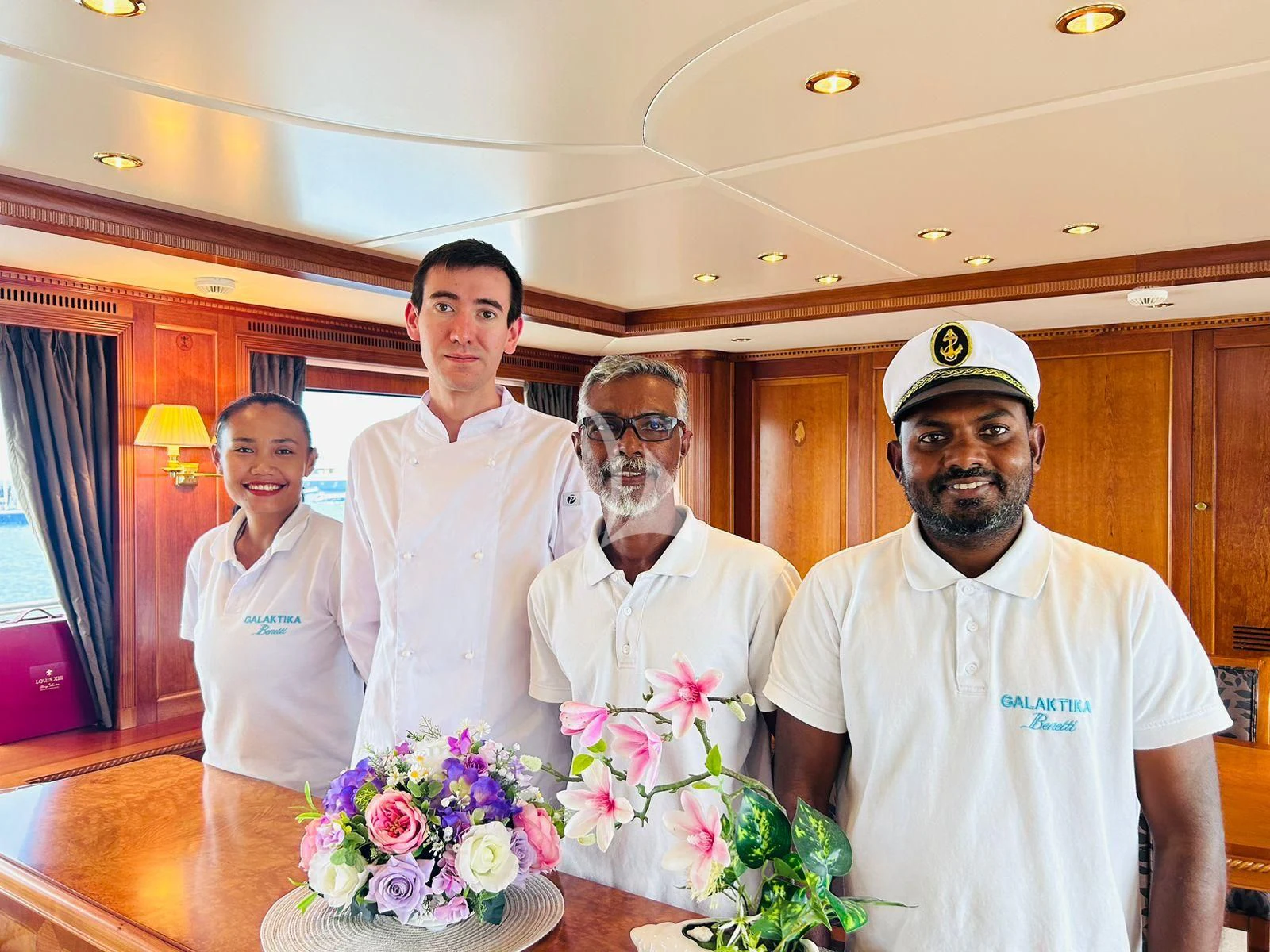 a group of people in white robes aboard GALAKTIKA SKAY Yacht for Sale