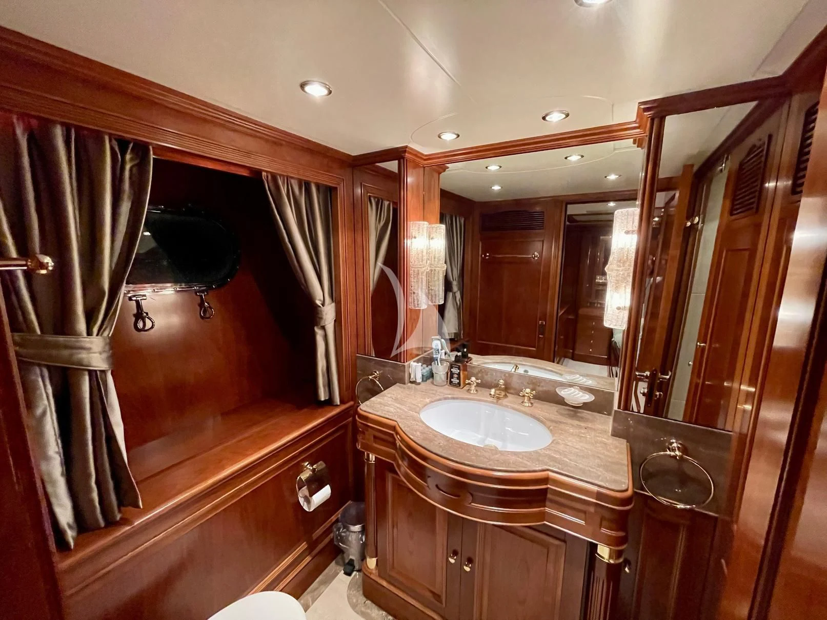 a bathroom with a sink and a mirror aboard GALAKTIKA SKAY Yacht for Sale
