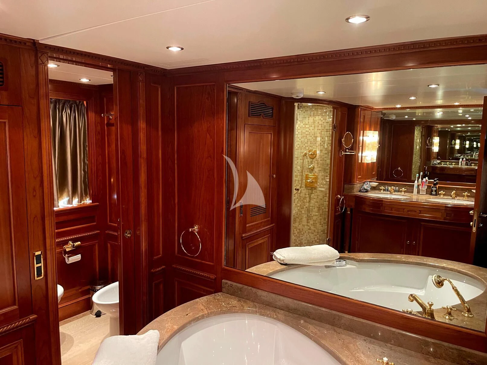 a bathroom with a large bathtub aboard GALAKTIKA SKAY Yacht for Sale