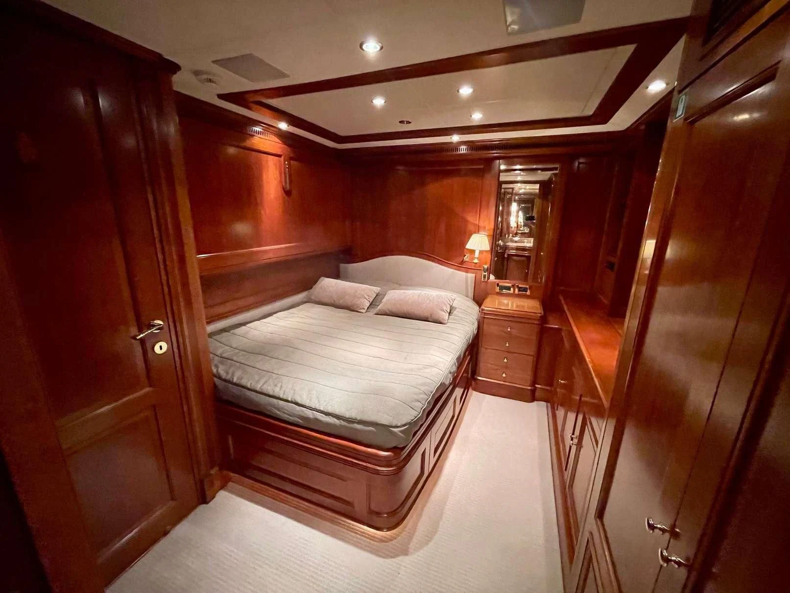 a bed in a room aboard GALAKTIKA SKAY Yacht for Sale