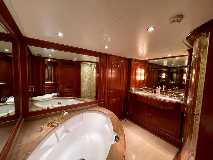 a bathroom with a large bathtub aboard GALAKTIKA SKAY Yacht for Sale