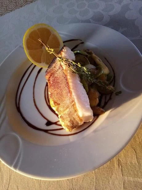 a plate of food aboard GALAKTIKA SKAY Yacht for Sale