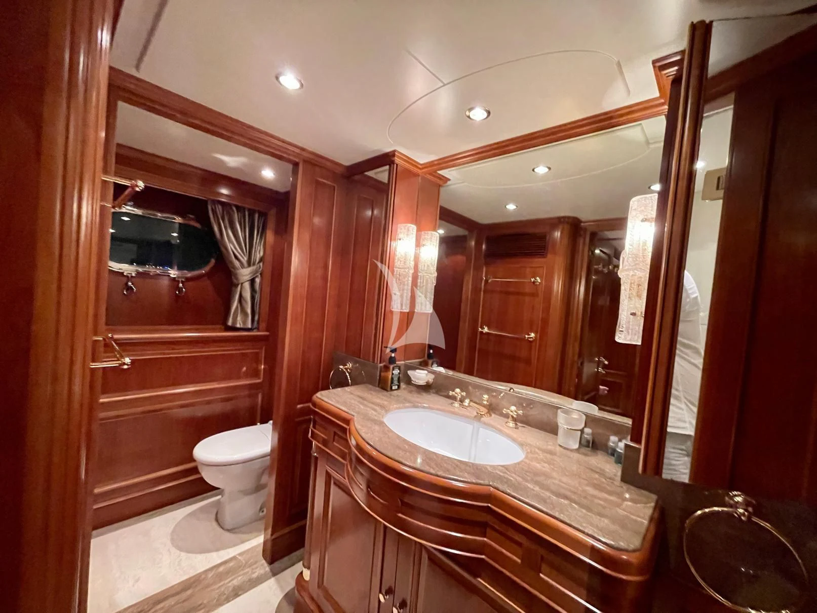 a bathroom with a sink and a mirror aboard GALAKTIKA SKAY Yacht for Sale