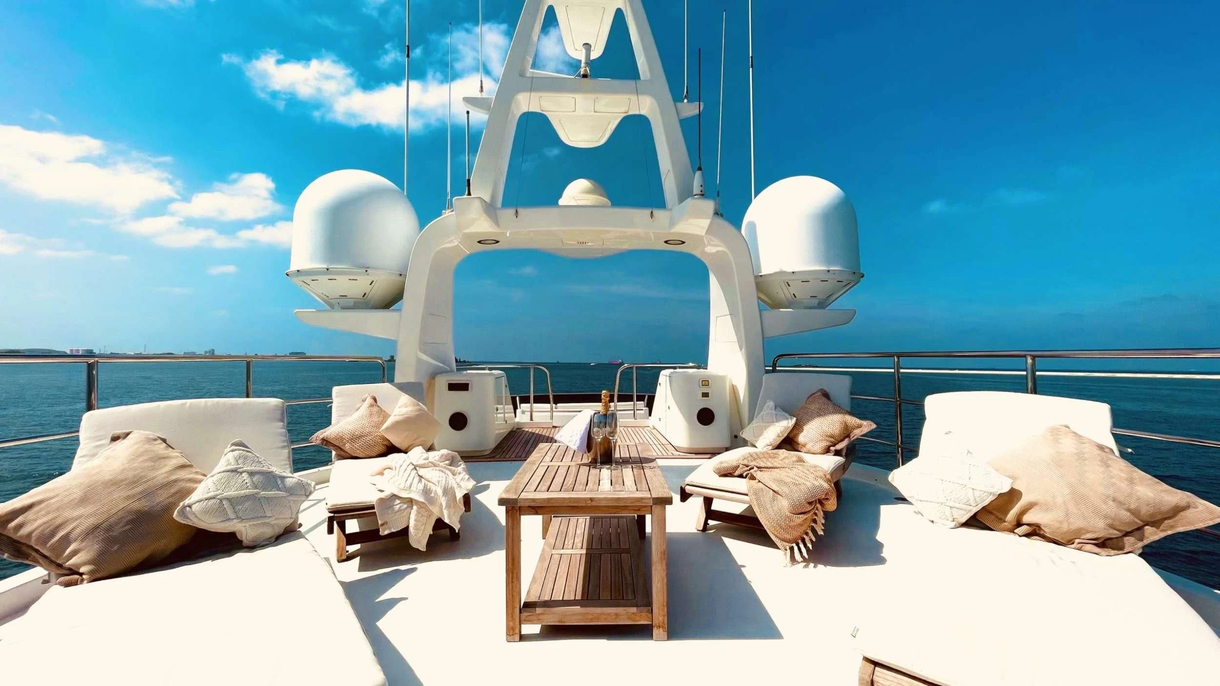 a large white ship on a beach aboard GALAKTIKA SKAY Yacht for Sale