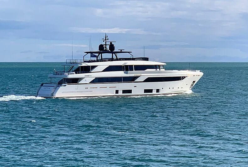 a white yacht in the water aboard APRIL Yacht for Sale