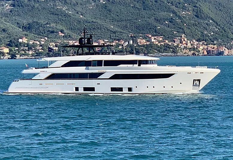 a white yacht in the water aboard APRIL Yacht for Sale