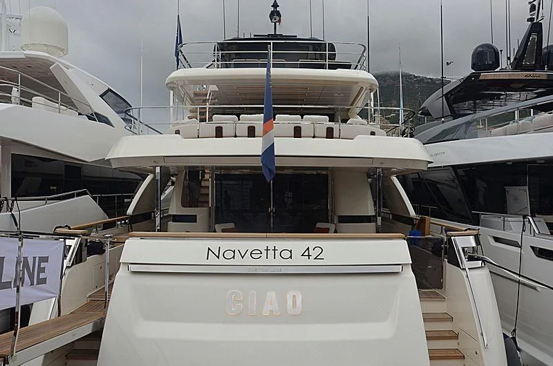 a boat docked at a pier aboard APRIL Yacht for Sale