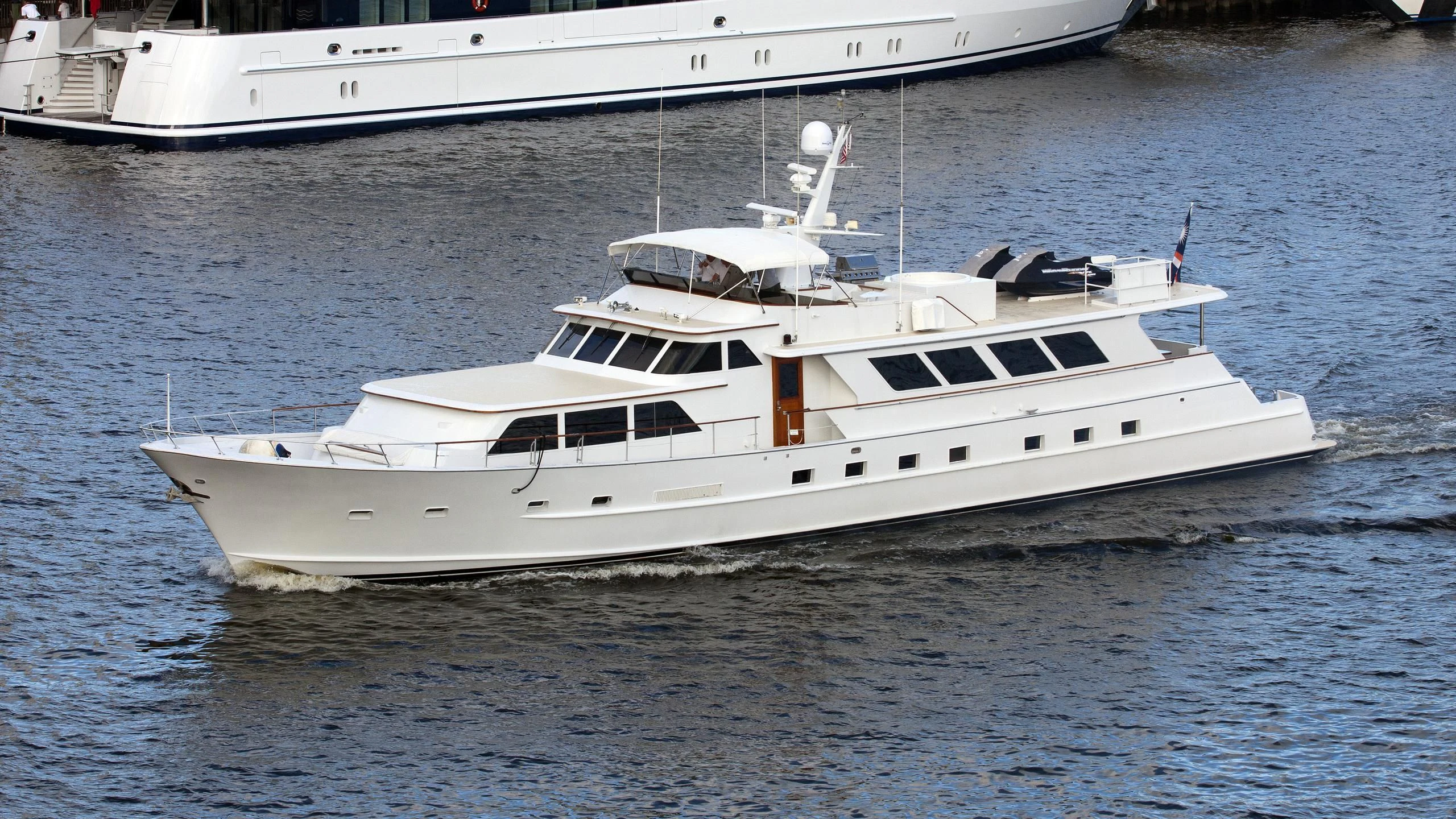 a white yacht in the water aboard LADY P Yacht for Sale