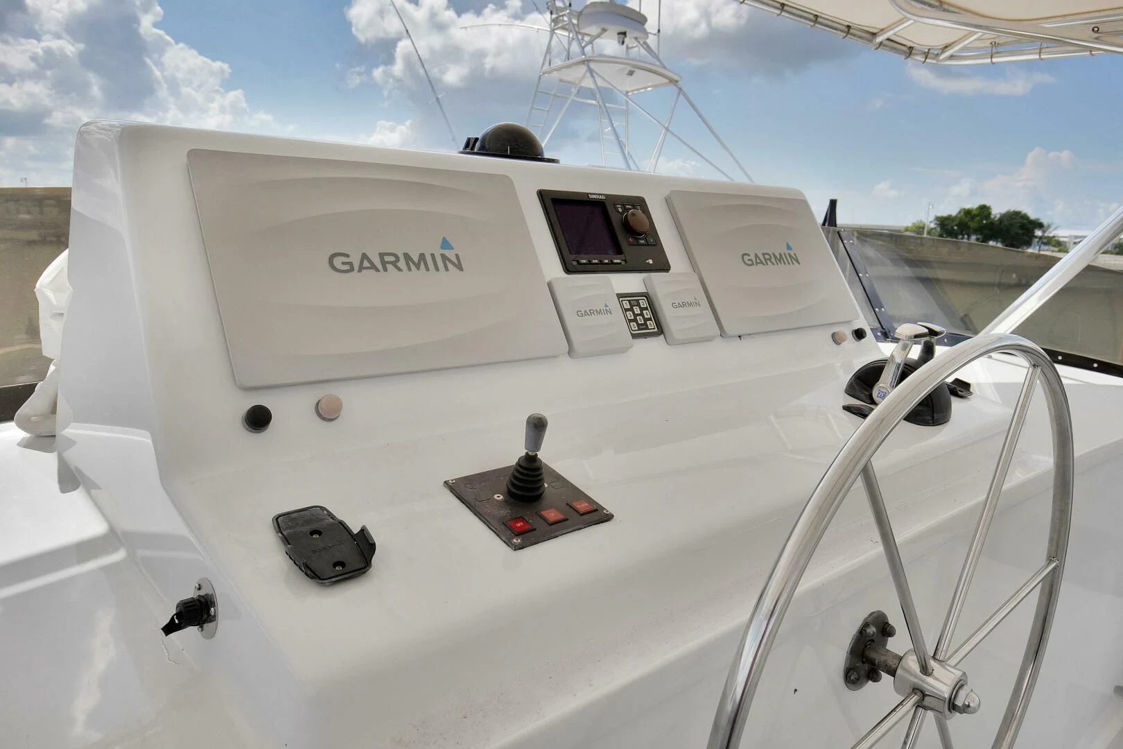 a white boat with a black cap on it aboard LADY P Yacht for Sale