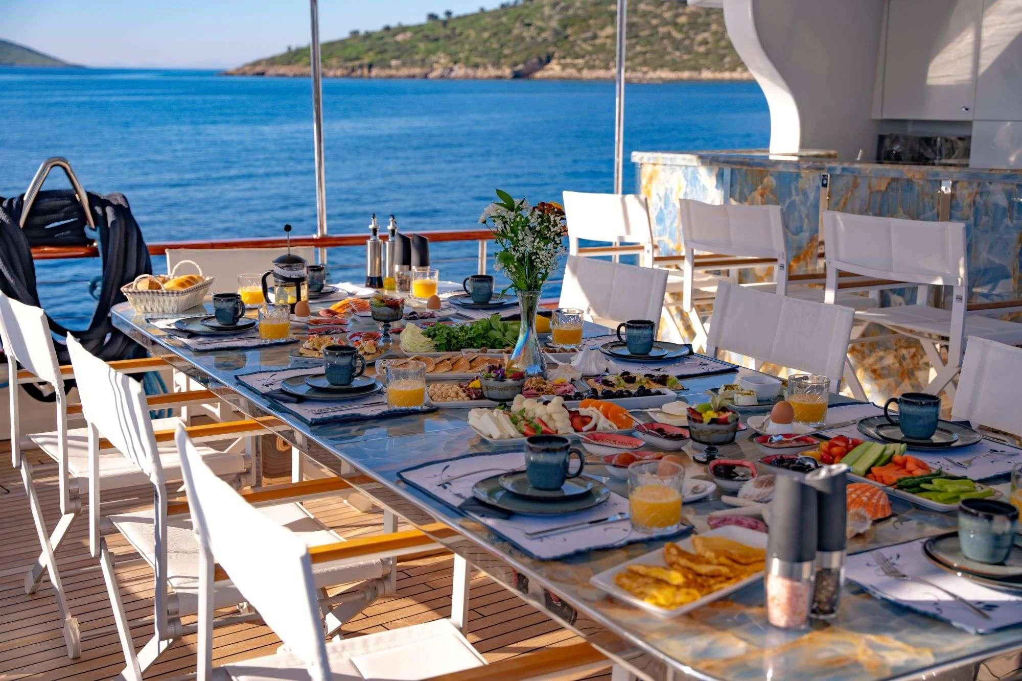 a table with food on it aboard DOUBLE EAGLE Yacht for Sale
