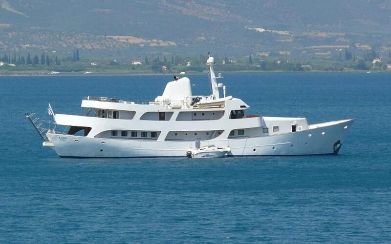 a white yacht in the water aboard ELIKI Yacht for Sale