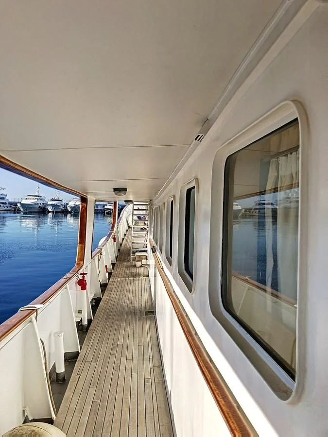 a train on the railway tracks aboard ELIKI Yacht for Sale