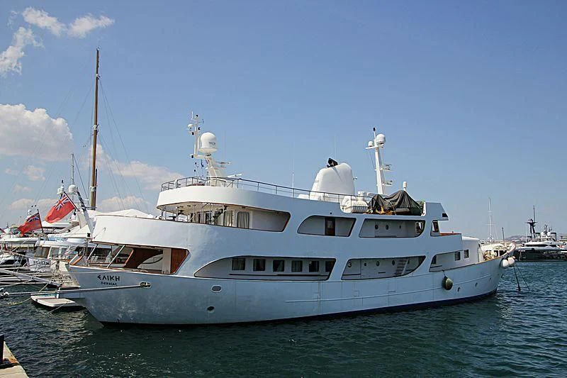 a large white boat in the water aboard ELIKI Yacht for Sale
