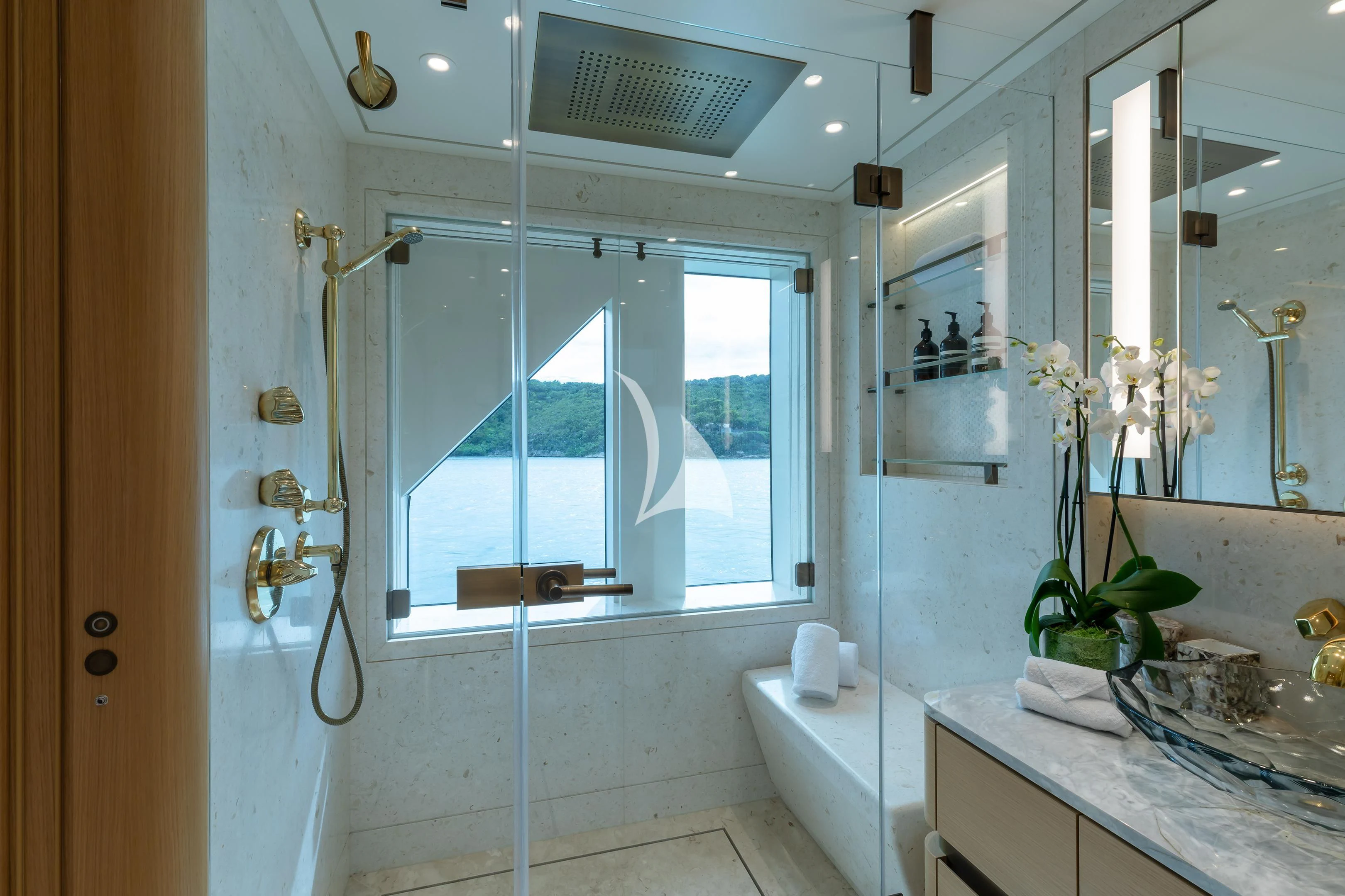 a bathroom with a tub sink and shower aboard COME TOGETHER Yacht for Charter