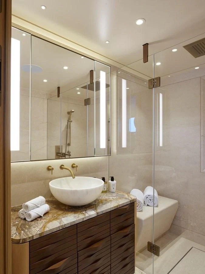 a bathroom with a large mirror aboard COME TOGETHER Yacht for Charter