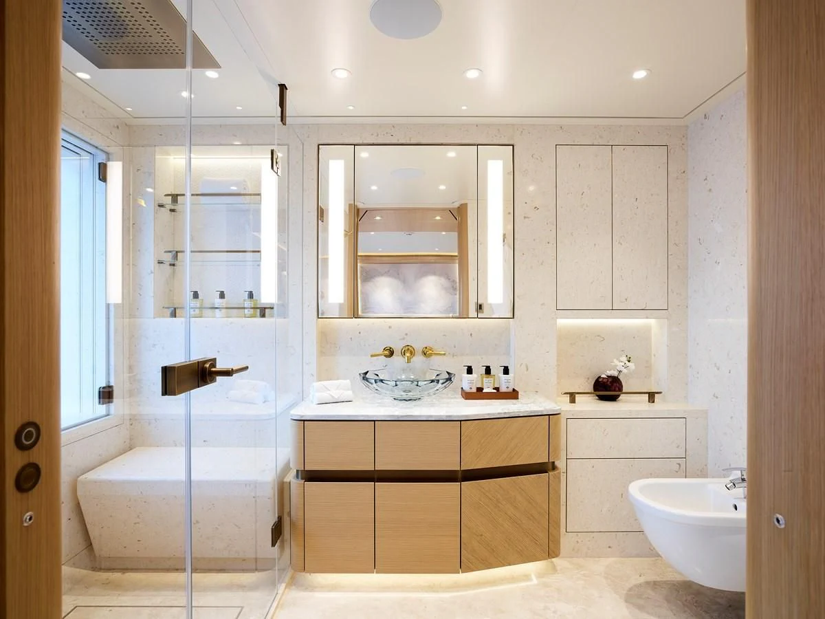 a bathroom with a glass shower aboard COME TOGETHER Yacht for Charter