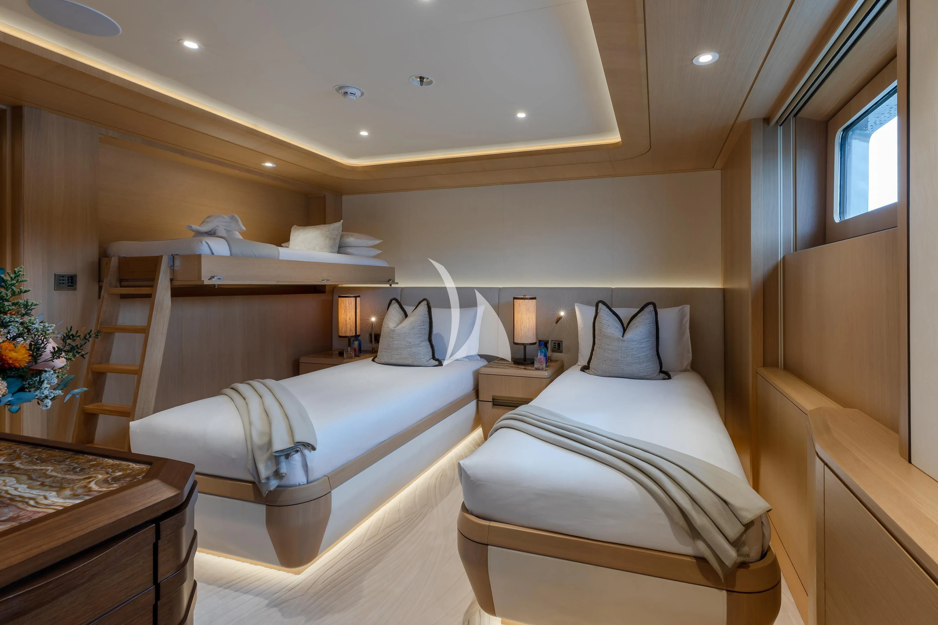 a couple of beds in a room aboard COME TOGETHER Yacht for Charter