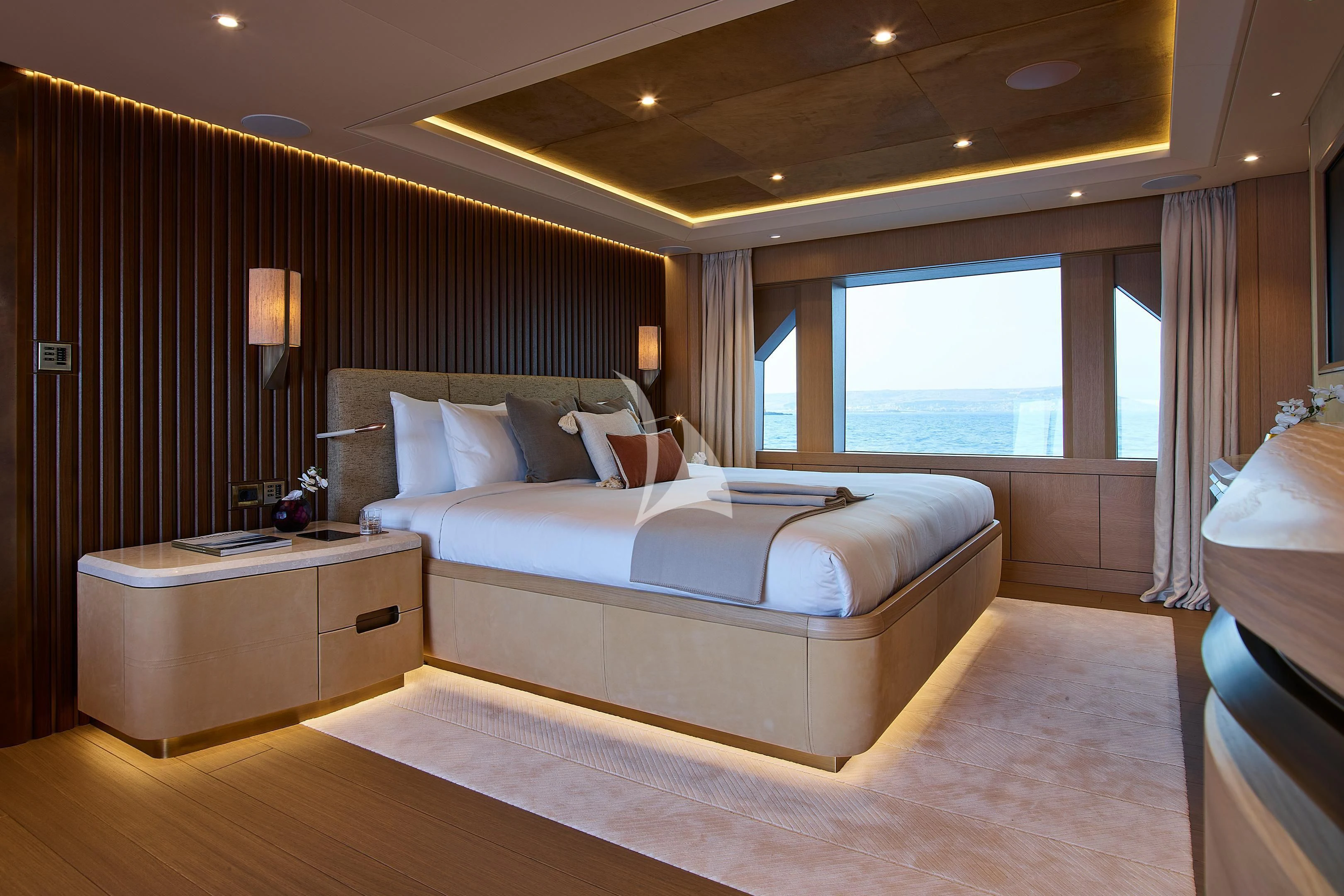 a hotel room with a bed aboard COME TOGETHER Yacht for Charter
