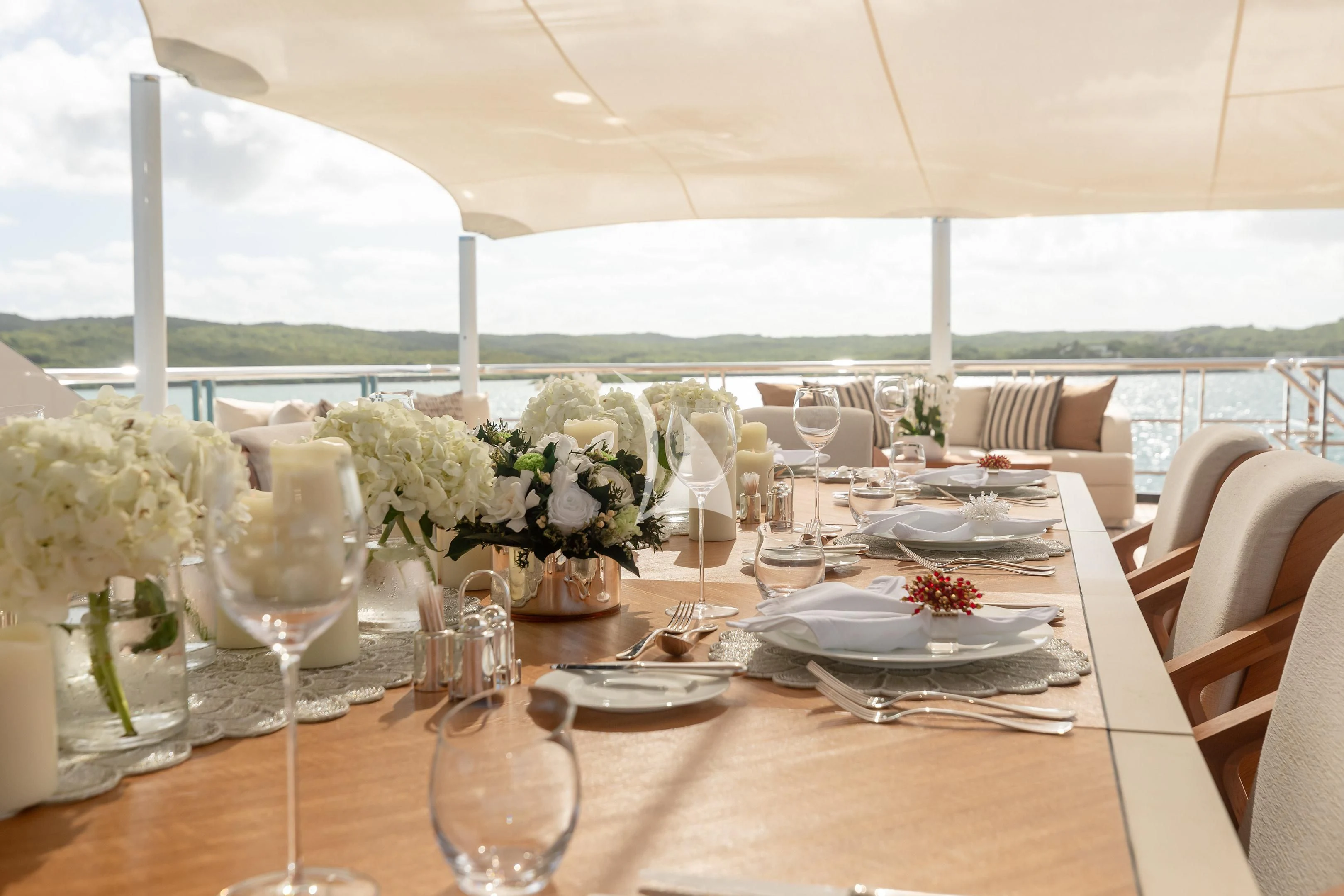 a table set for a wedding aboard COME TOGETHER Yacht for Charter