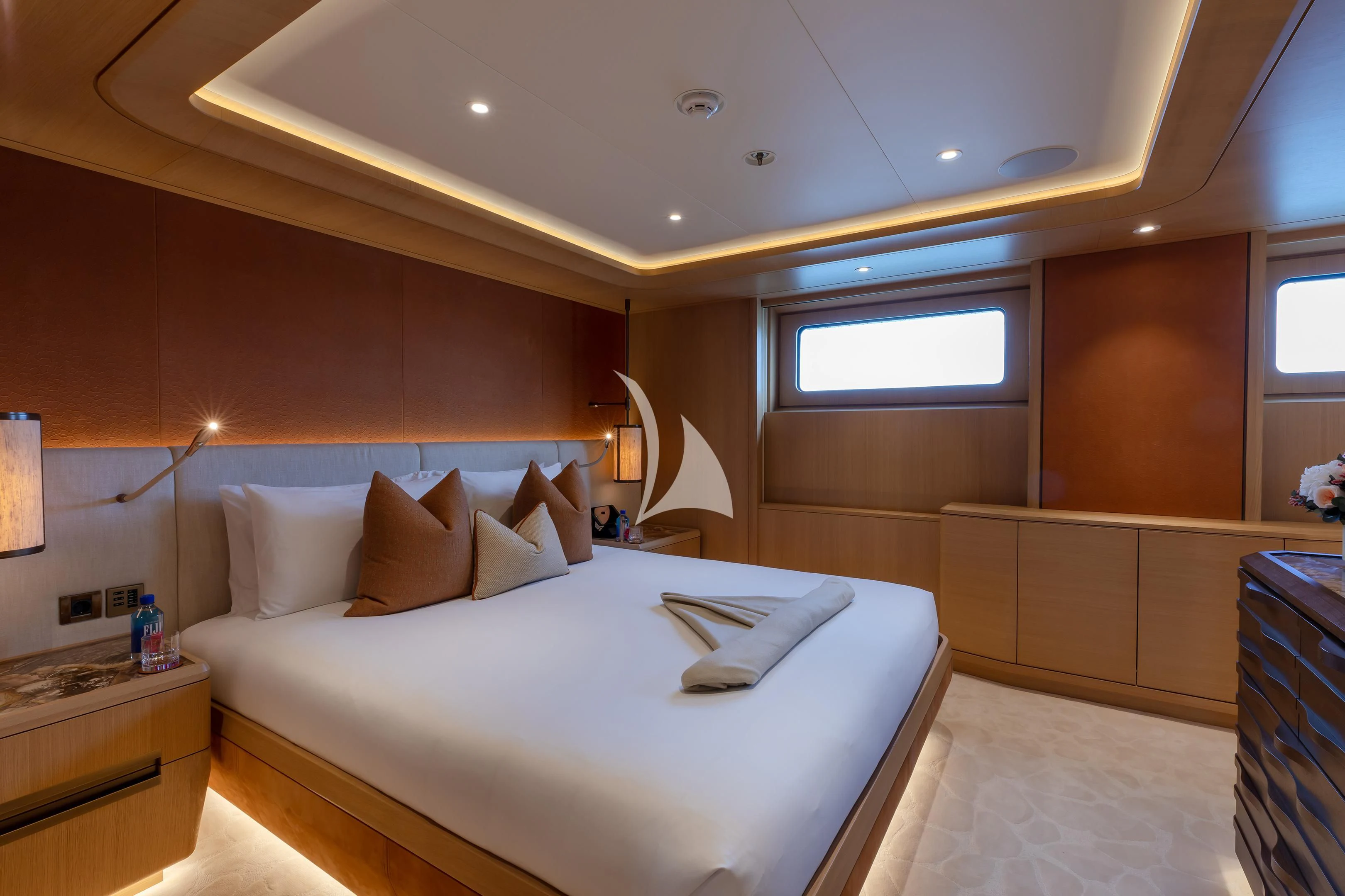 a bed in a room aboard COME TOGETHER Yacht for Charter