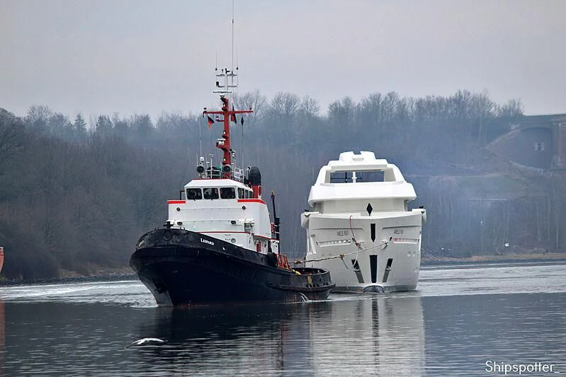 a couple of large boats on a lake aboard COME TOGETHER Yacht for Charter