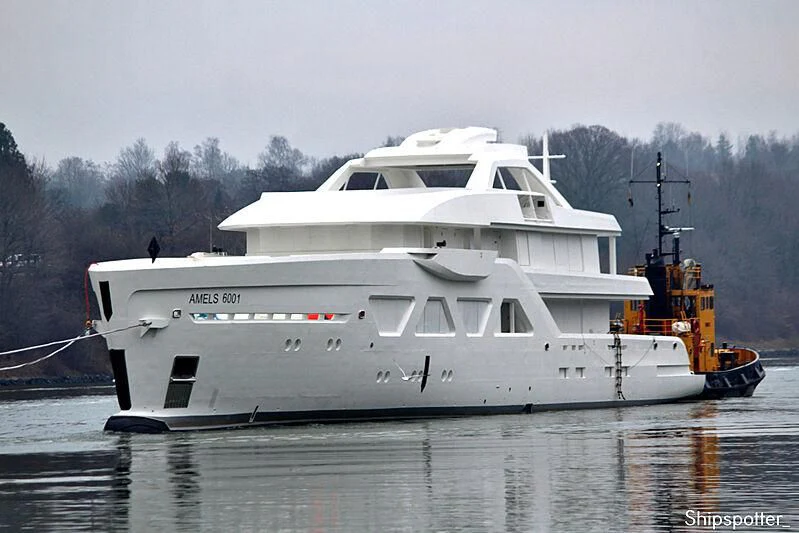a large white boat on a body of water aboard COME TOGETHER Yacht for Charter