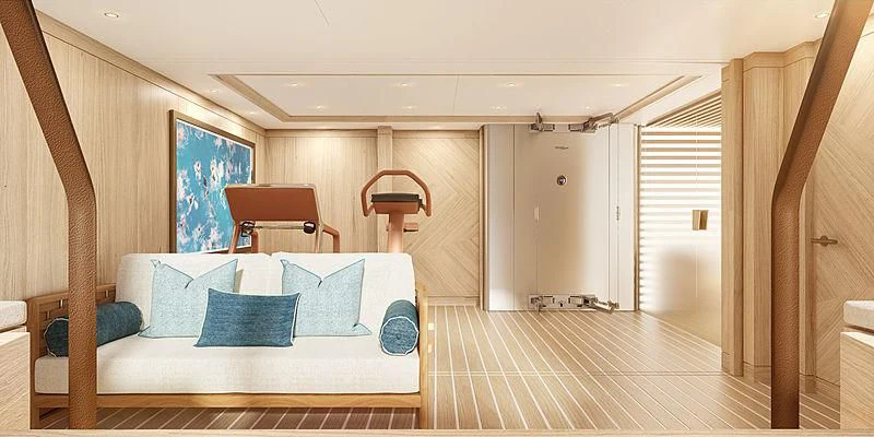 a room with a bed and a chair aboard COME TOGETHER Yacht for Charter