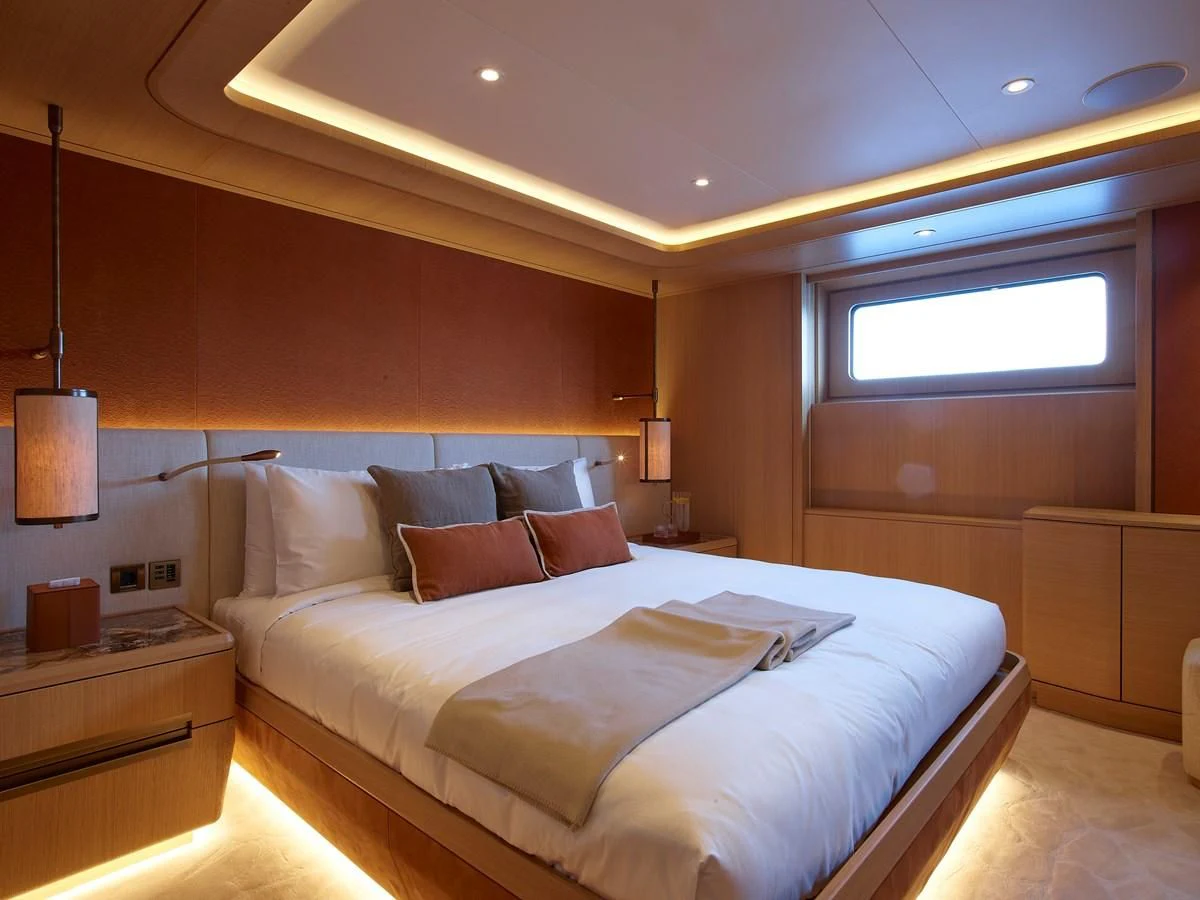 a bed in a room aboard COME TOGETHER Yacht for Charter