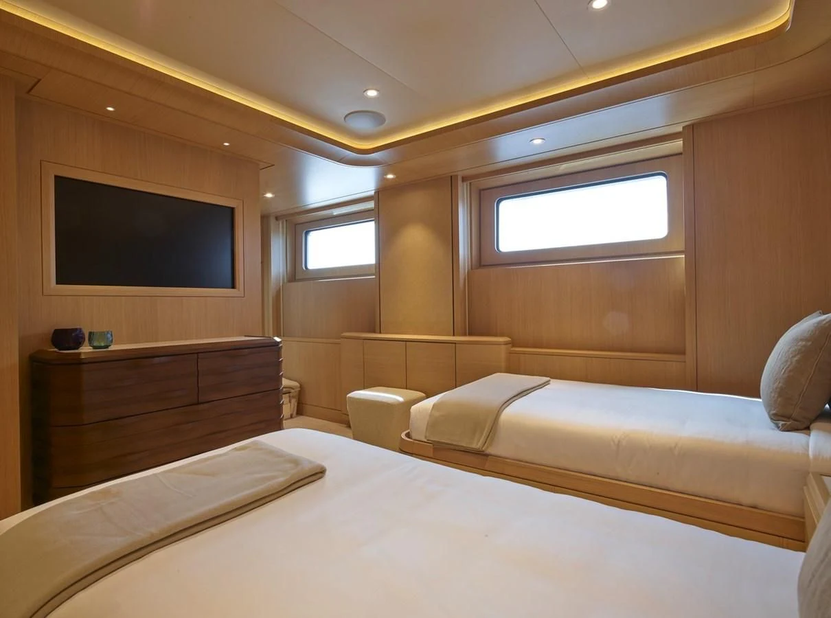 a room with two beds aboard COME TOGETHER Yacht for Charter