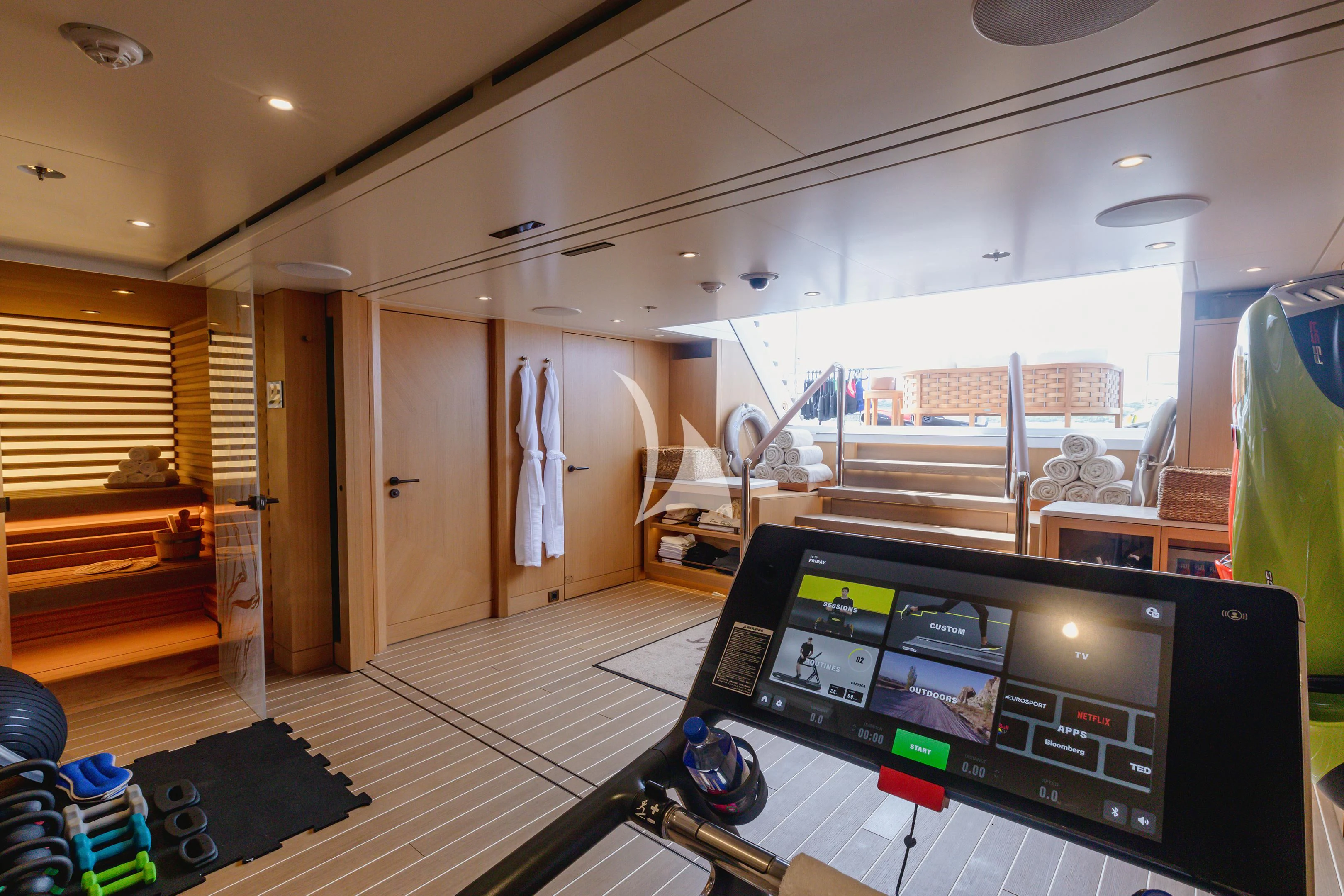 a room with a tv and a bed aboard COME TOGETHER Yacht for Charter