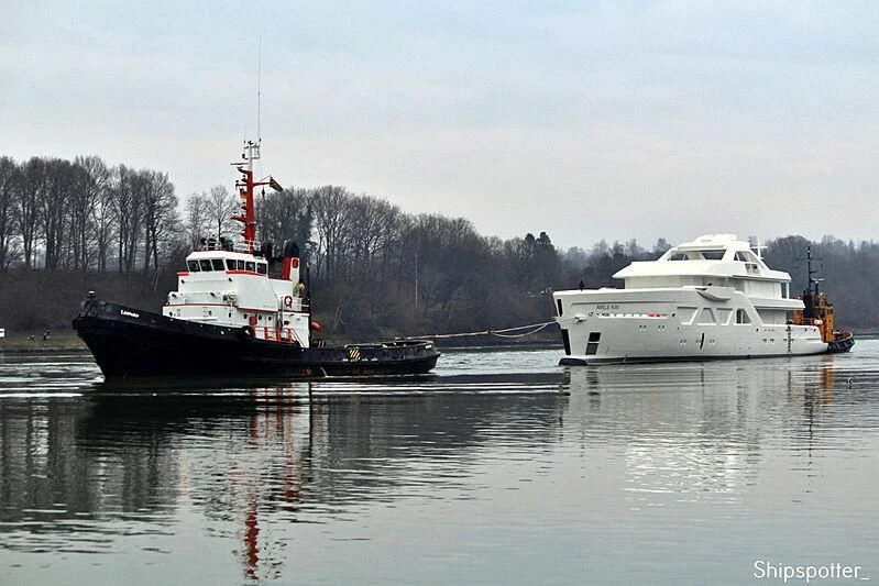 a couple of boats on a lake aboard COME TOGETHER Yacht for Charter