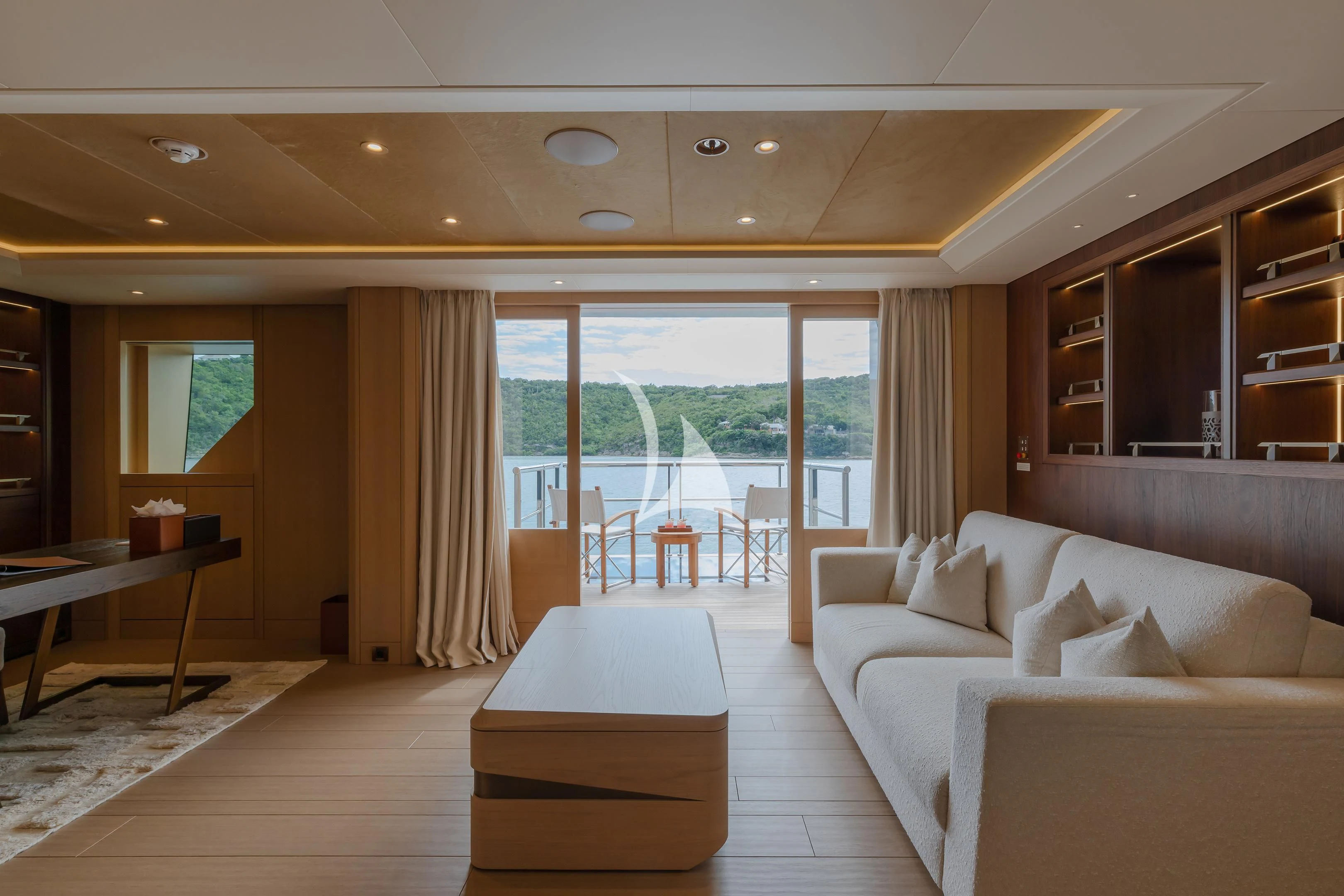 a living room with a large window aboard COME TOGETHER Yacht for Charter